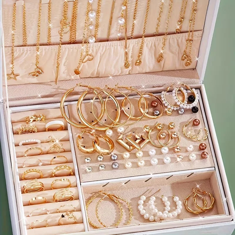 86 pcs gold jewelry set for women with pearl earrings, hoops, rings and necklaces in a jewelry box