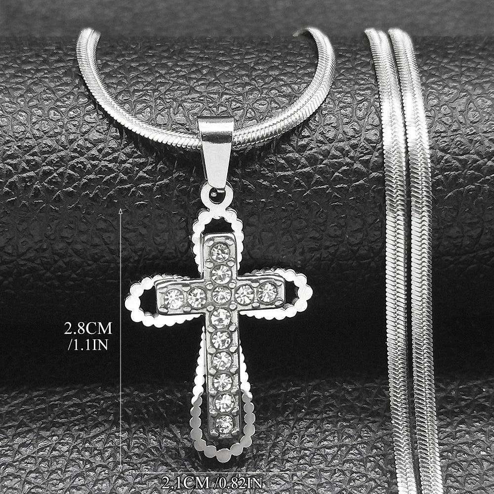 Small silver crystal cross pendant measuring 1.1 inches with flat silver chain