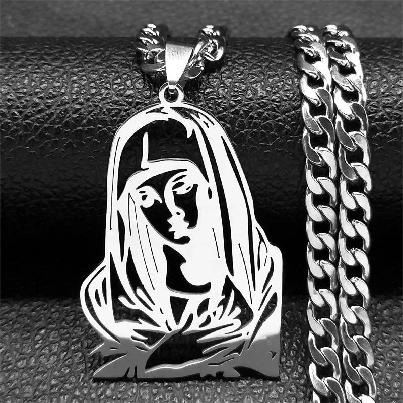 Silver-tone veiled Virgin Mary pendant shown beside a silver curb chain