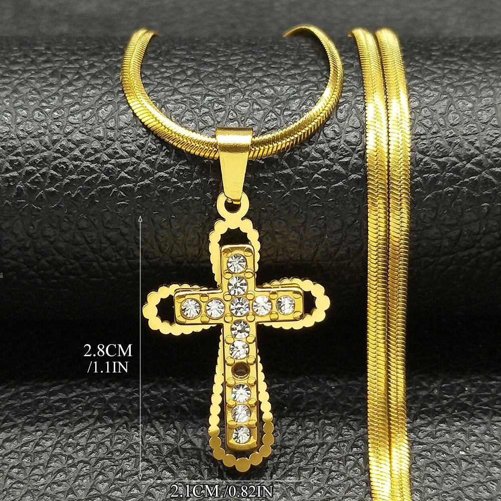 Small gold crystal cross pendant measuring 1.1 inches with flat gold chain