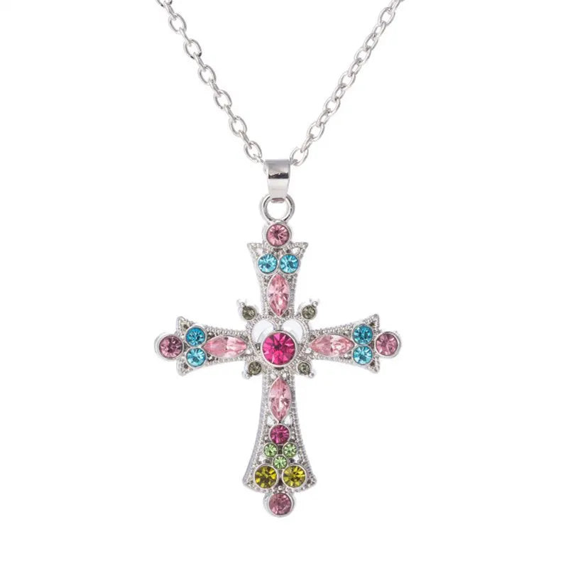 Silver cross pendant necklace set with pastel pink, blue, yellow and green rhinestones