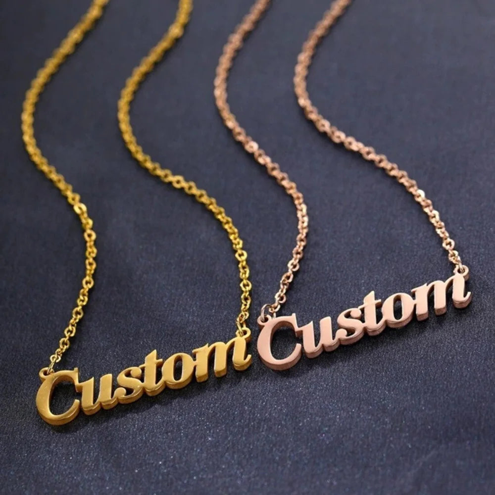 Gold and rose gold personalized name necklaces side by side showing both plating options